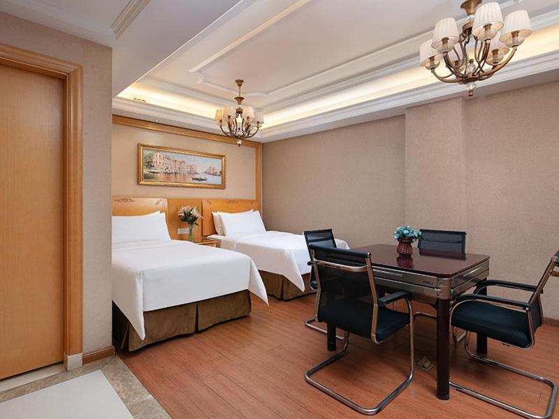 Vienna International Hotel Jiujiang Shili Street Exterior photo